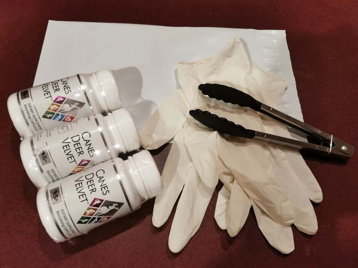 a pair of gloves, a pair of scissors, and a pair of white gloves.
